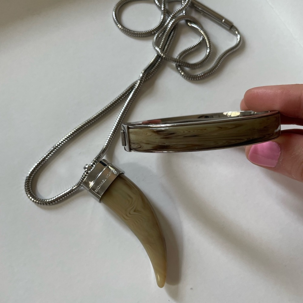 Michael Kors Silver Resin Horn Necklace and Bracelet.
